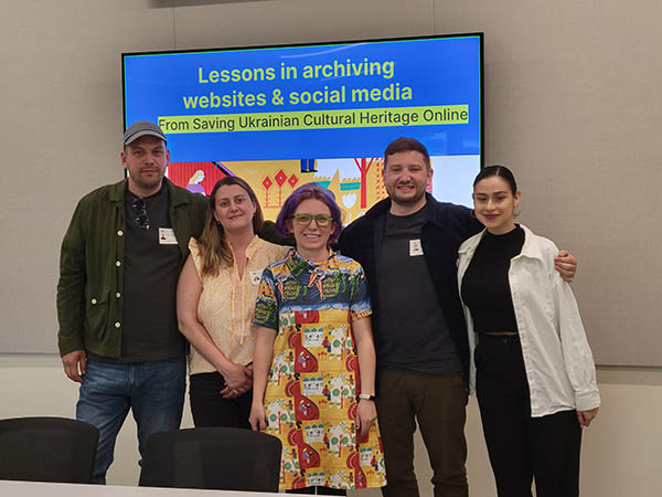 SUCHO team with the opening slide for the web and social media archiving workshop